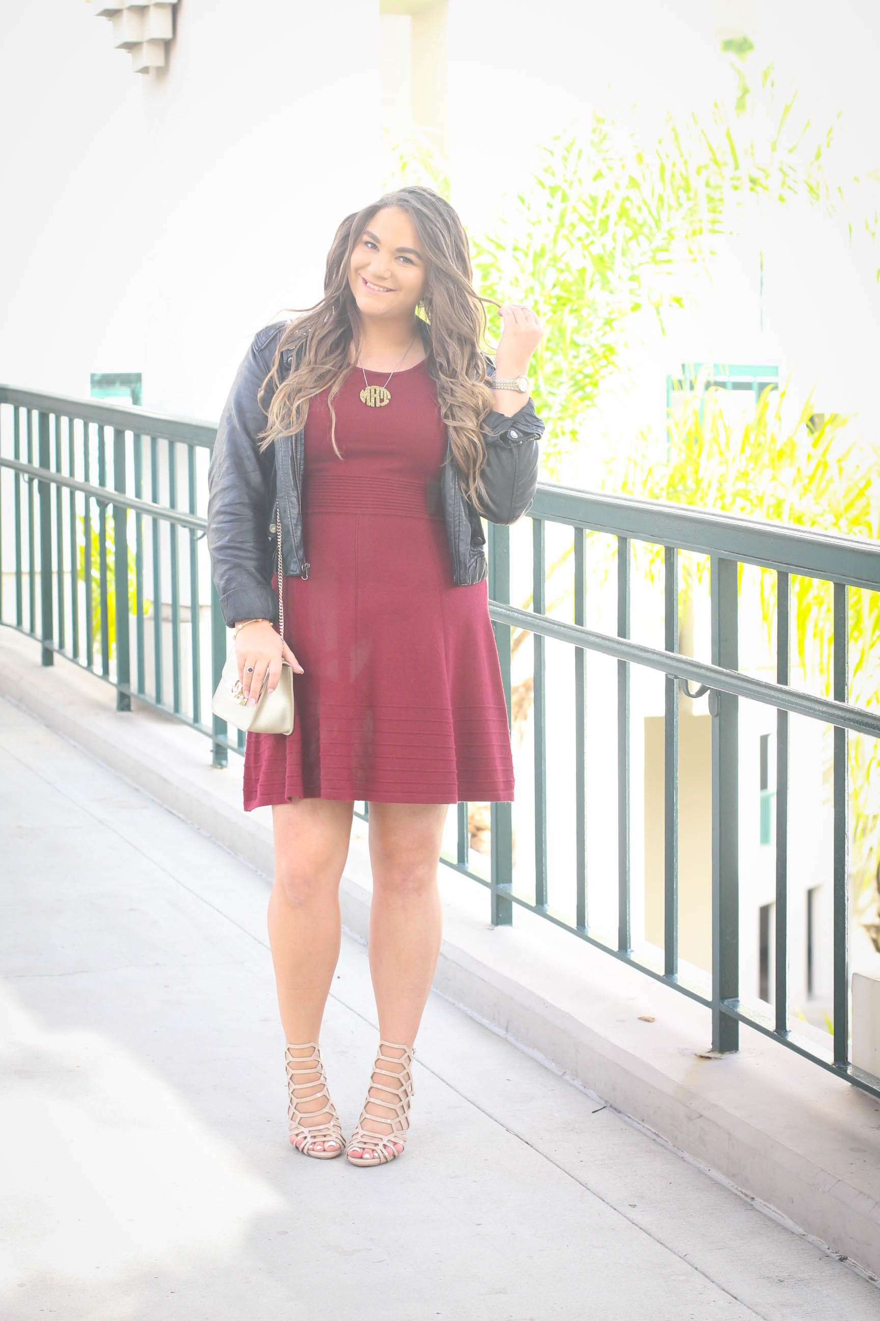 missyonmadison, sweater dress, how to style a sweater dress, how to style a moto jacket, moto jacket, maroon dress, maroon sweater dress, caged heels, nude gladiator heels, gold crossbody bag, gold bag, mezzanotte bag, nude heels, nude caged heels, holiday dress guide, what to wear for the holidays, christmas outfit ideas, melissa tierney, sweater dress,